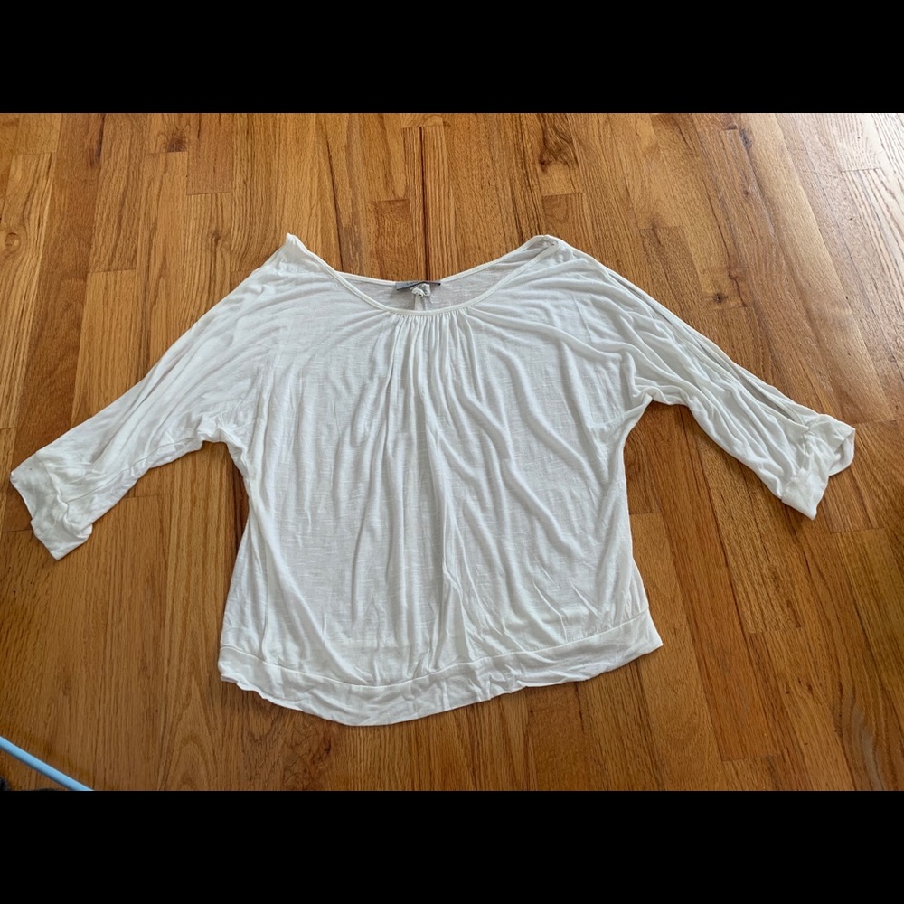 White quarter length sleeves